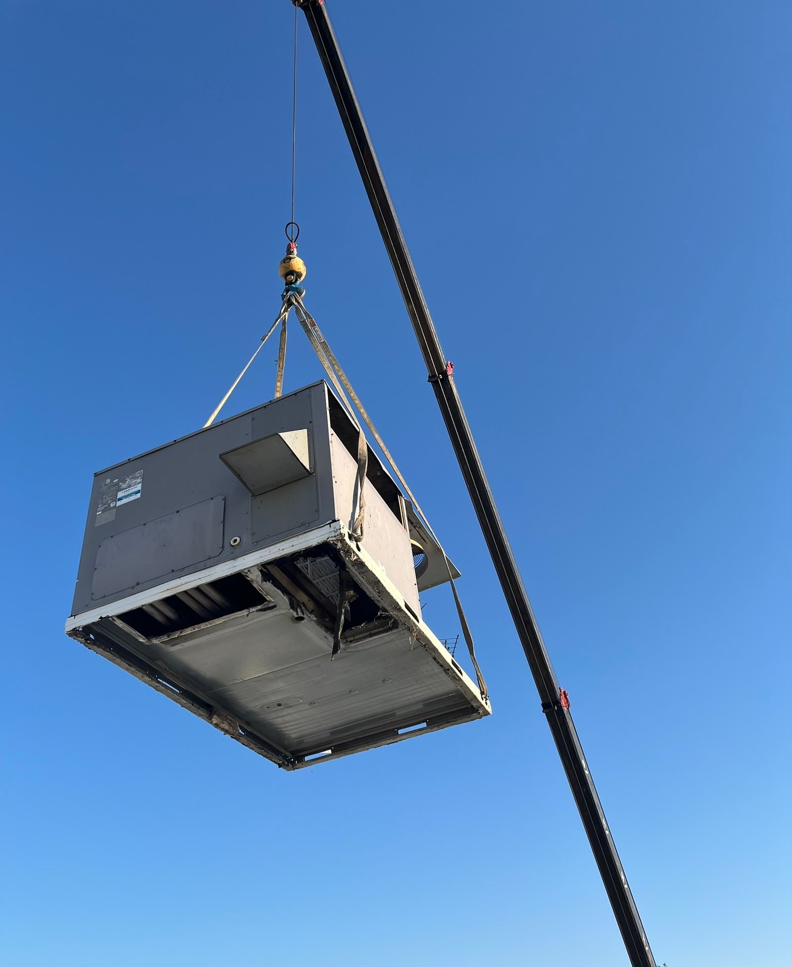 Cool Jay’s Air Conditioning professional assessing Bakersfield home for optimal air conditioner installation