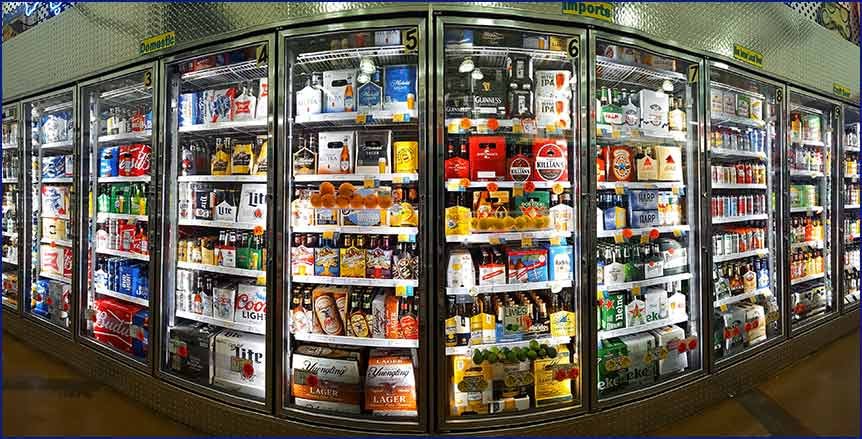 Cool Jay’s Air Conditioning technician conducting a thorough inspection of commercial refrigeration systems in Bakersfield, ensuring efficiency and reliability